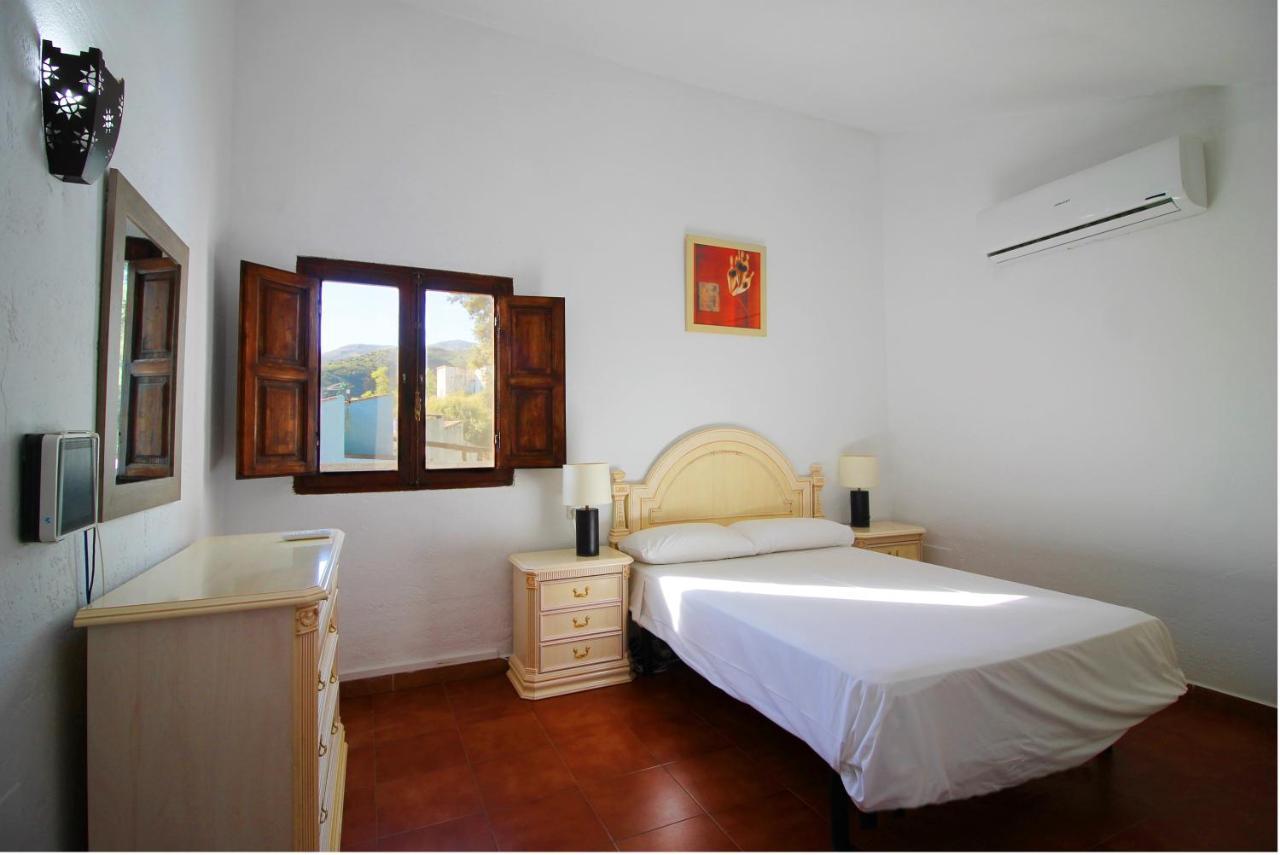 Casas Rurales Juzcar Centro Bagian luar foto