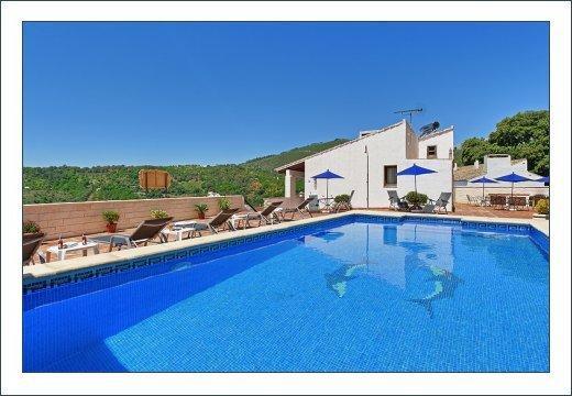 Casas Rurales Juzcar Centro Bagian luar foto